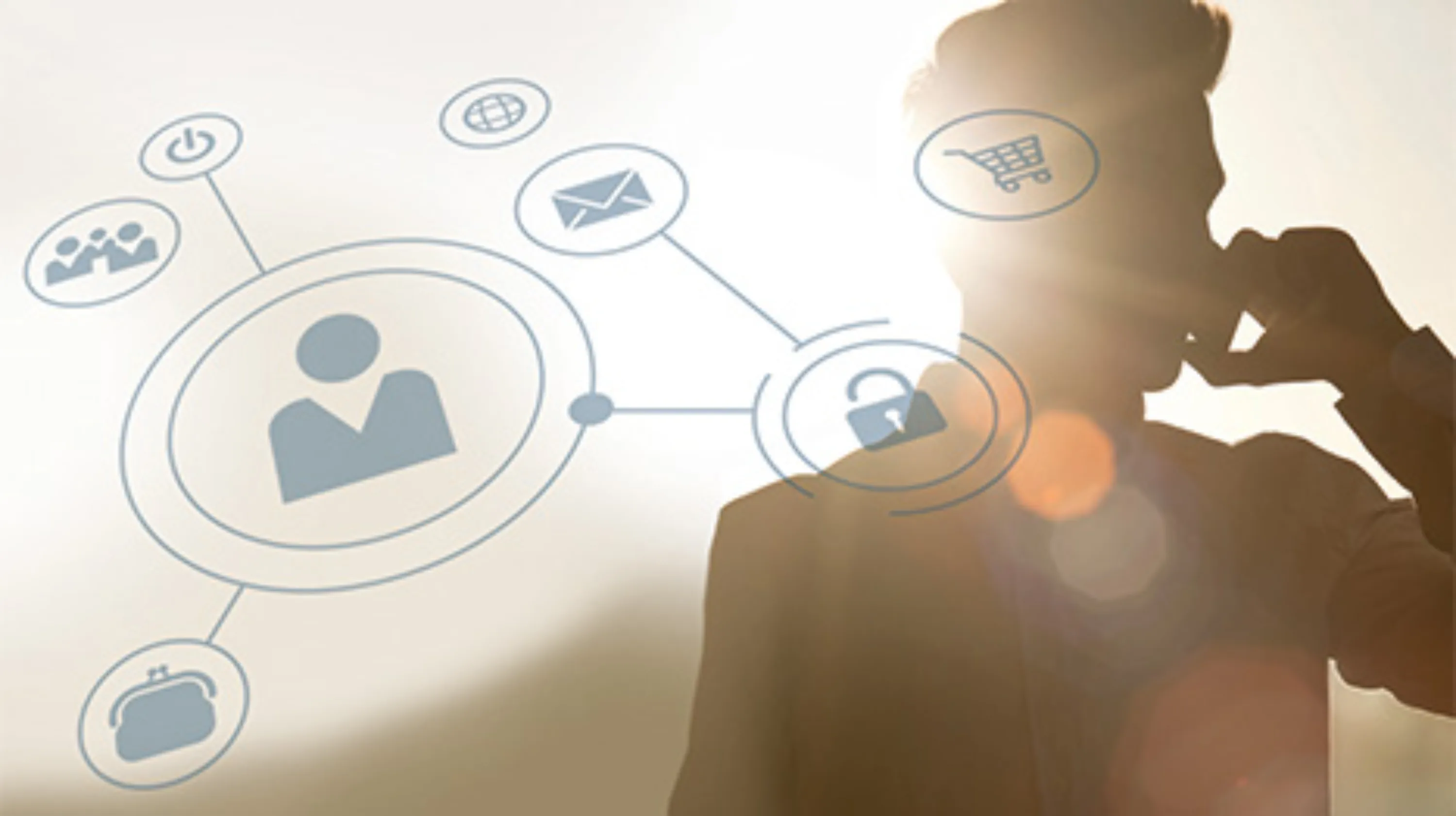 Immagine generata al computer raffigurante una rete informatica, con sullo sfondo un uomo al telefono.